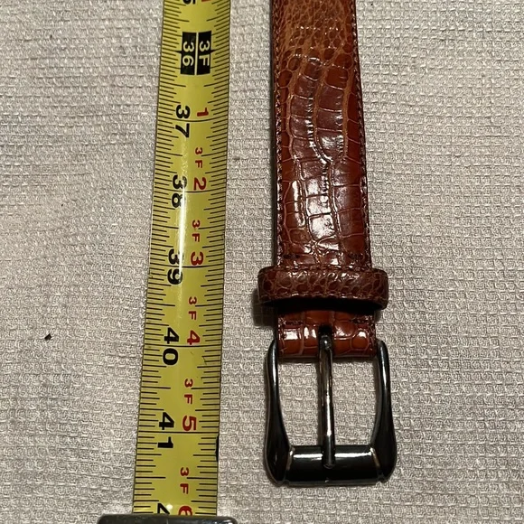 de Vecchi American alligator belt with silver buckle and tip
